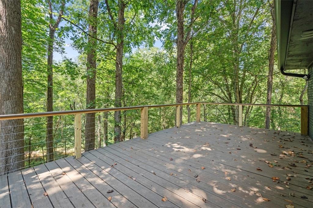 2237 Clem Lowell Road Carrollton, GA 30116 - Photo 34 of 60 a view of balcony with wooden floor