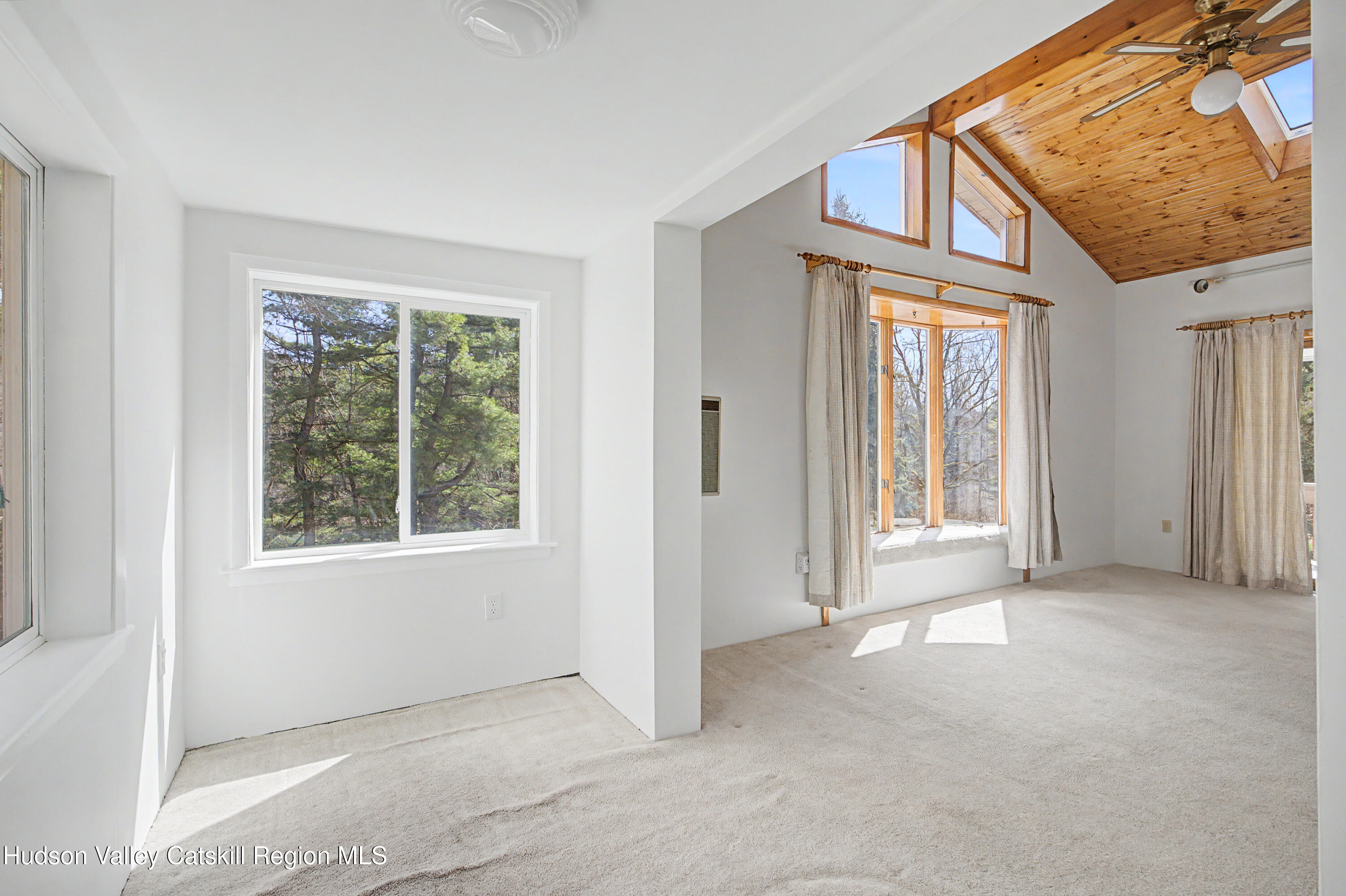524 Angel Hill Road Chatham, NY 12037 - Photo 15 of 33 an empty room with windows and closet