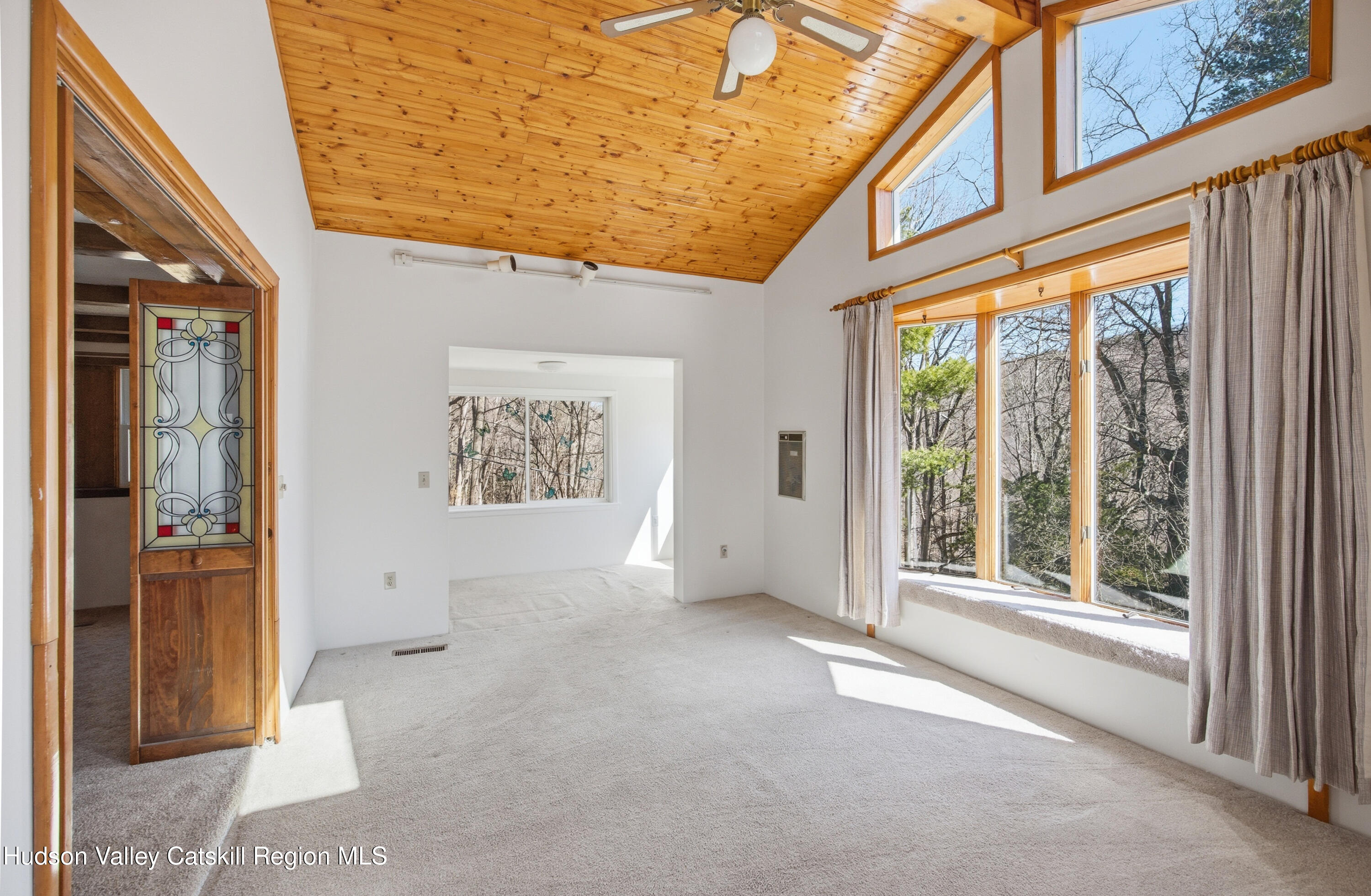 524 Angel Hill Road Chatham, NY 12037 - Photo 17 of 33 a view of an empty room with a window