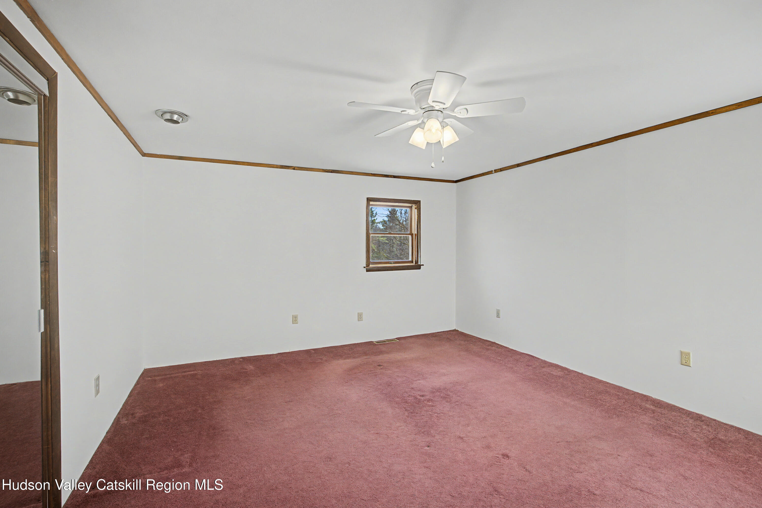 524 Angel Hill Road Chatham, NY 12037 - Photo 18 of 33 a view of an empty room with a window