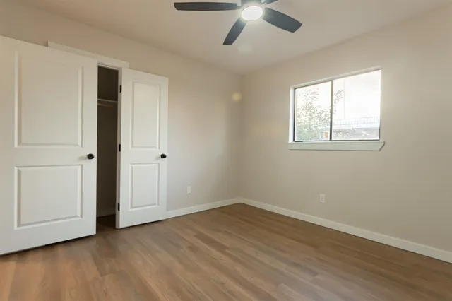 a bathroom with a shower a toilet and a shower