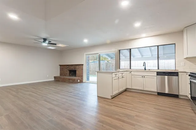 a view of front door and small yard