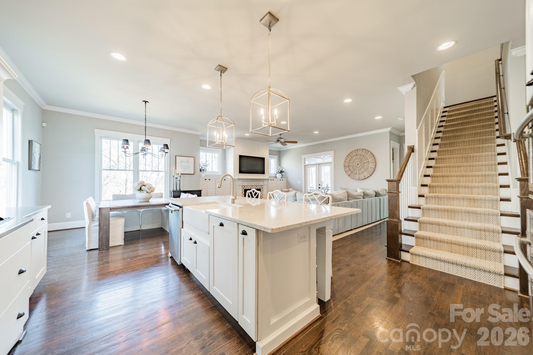 2289 Tatton Hall Road Fort Mill, SC 29715 - Photo 11 of 48 a kitchen with kitchen island white cabinets and sink