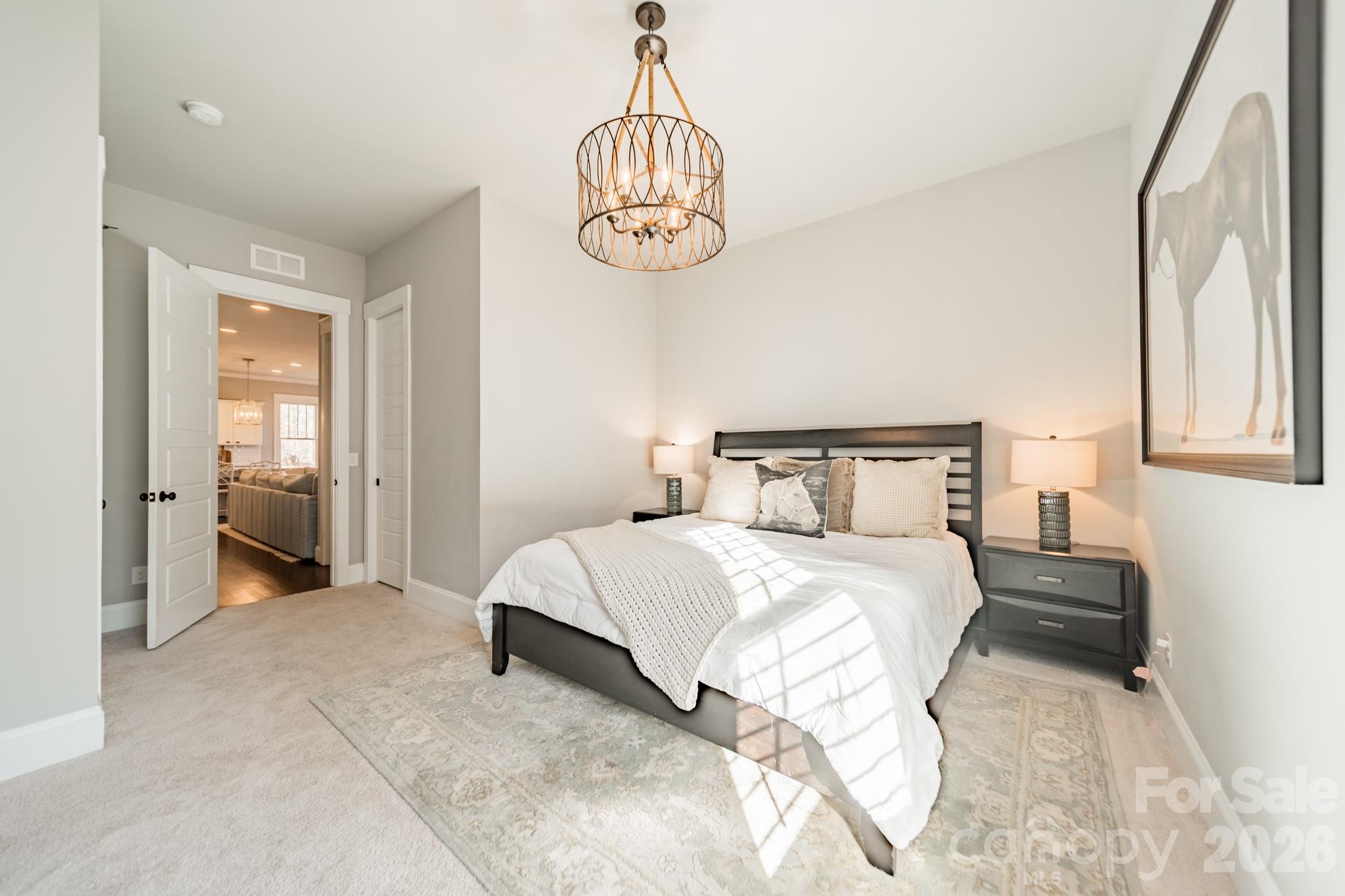 2289 Tatton Hall Road Fort Mill, SC 29715 - Photo 28 of 48 a bedroom with a bed and a window