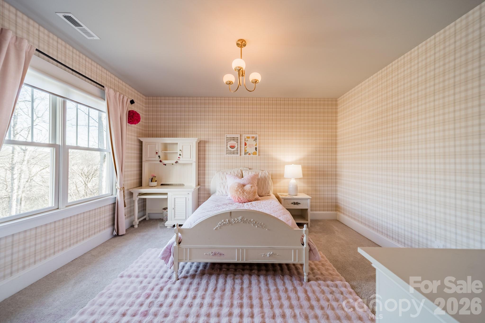 2289 Tatton Hall Road Fort Mill, SC 29715 - Photo 32 of 48 a bedroom with a bed and wooden floor