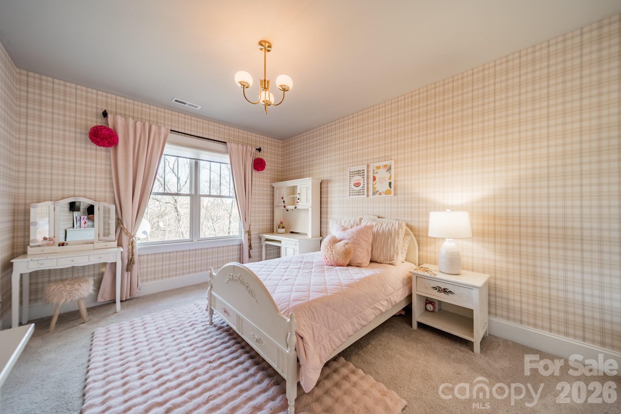 2289 Tatton Hall Road Fort Mill, SC 29715 - Photo 33 of 48 a bedroom with a bed couch and window