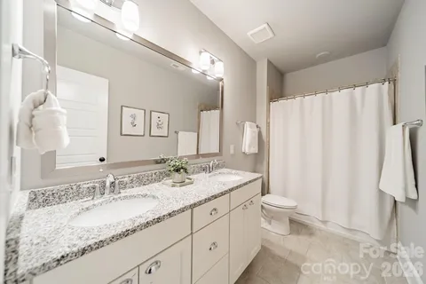 a room with a bed and a table