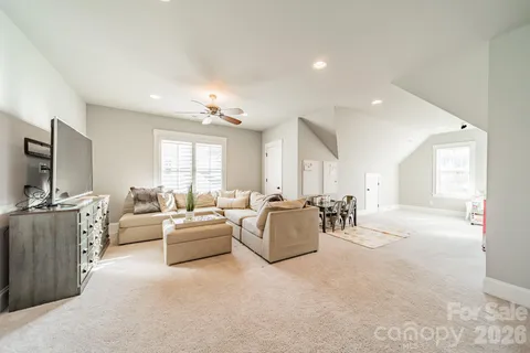 a view of a livingroom with furniture and window