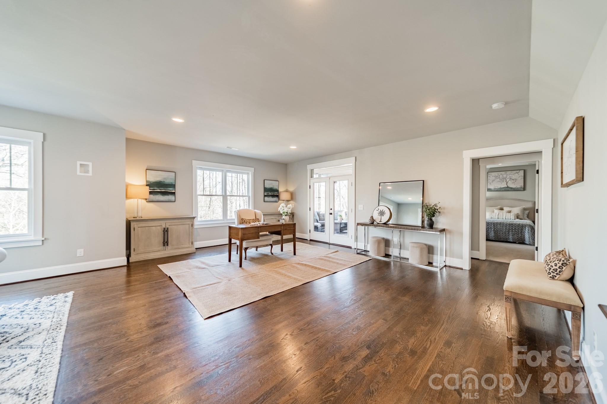 2289 Tatton Hall Road Fort Mill, SC 29715 - Photo 38 of 48 a living room with furniture and wooden floor