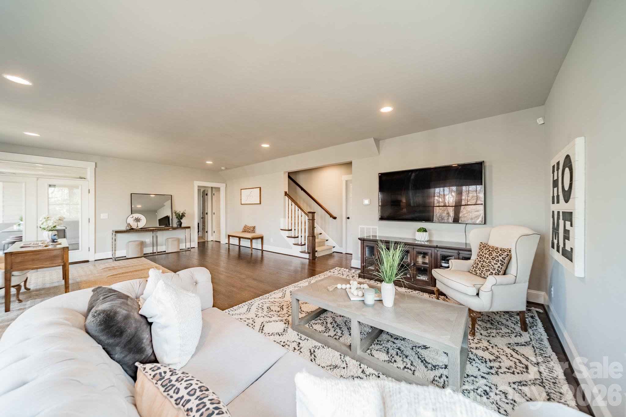 2289 Tatton Hall Road Fort Mill, SC 29715 - Photo 40 of 48 a living room with furniture and a flat screen tv