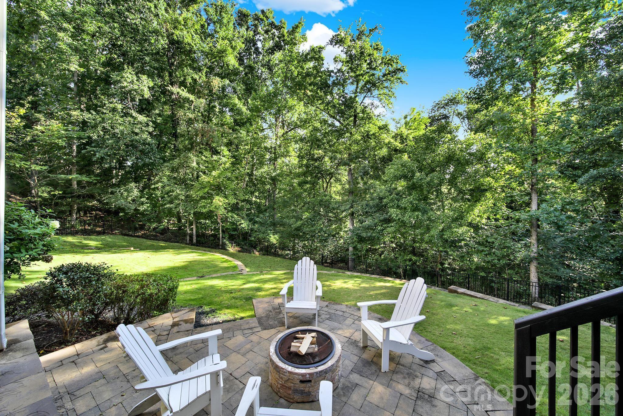 2289 Tatton Hall Road Fort Mill, SC 29715 - Photo 44 of 48 a backyard of a house with yard and outdoor seating