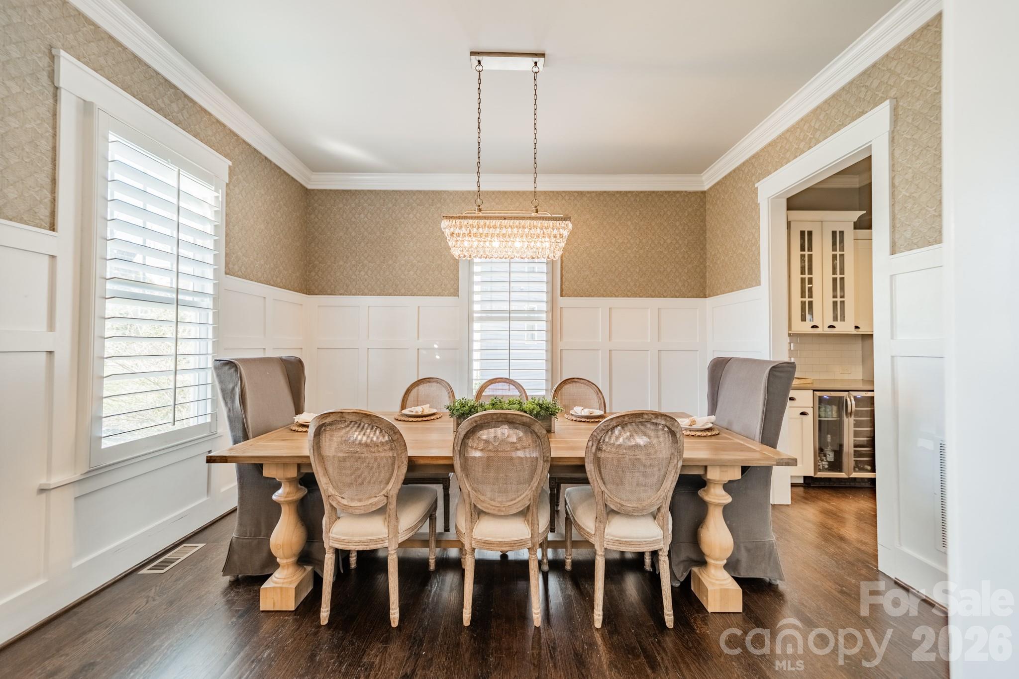 2289 Tatton Hall Road Fort Mill, SC 29715 - Photo 7 of 48 a view of a dining room with furniture and wooden floor