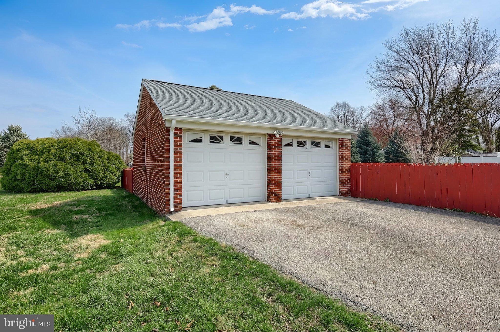 2208 Grandview Road Hanover, PA 17331 - Photo 21 of 39 a front view of a house with a yard and garage