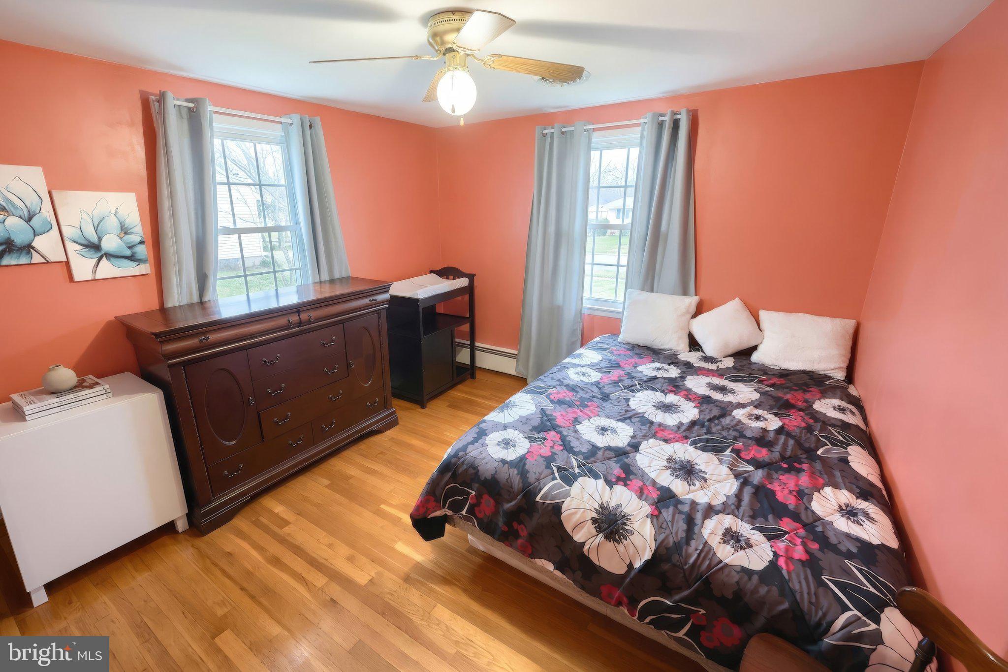 2208 Grandview Road Hanover, PA 17331 - Photo 23 of 39 a bedroom with a bed and wooden floor