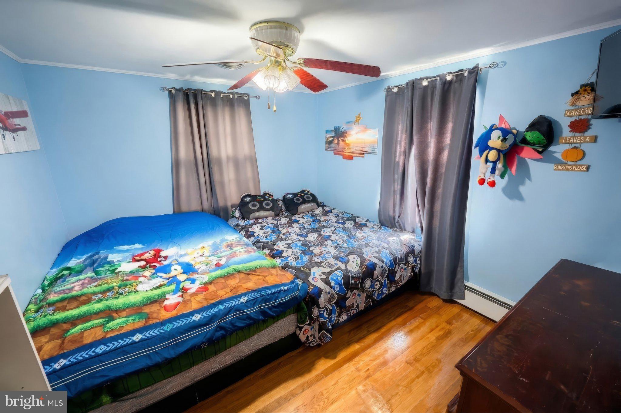 2208 Grandview Road Hanover, PA 17331 - Photo 28 of 39 a bedroom with a bed and a chandelier