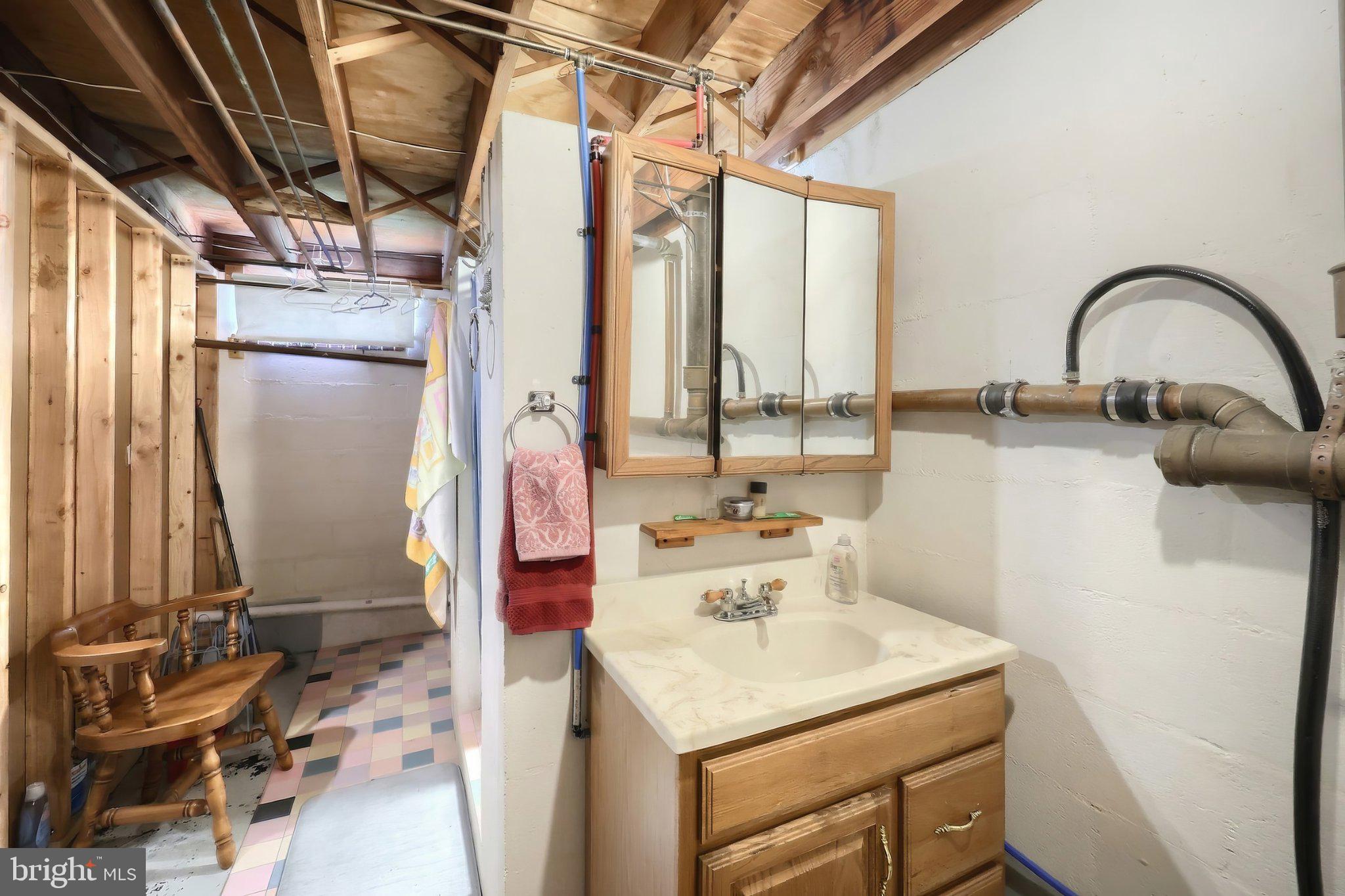 2208 Grandview Road Hanover, PA 17331 - Photo 31 of 39 a bathroom with a sink and a mirror