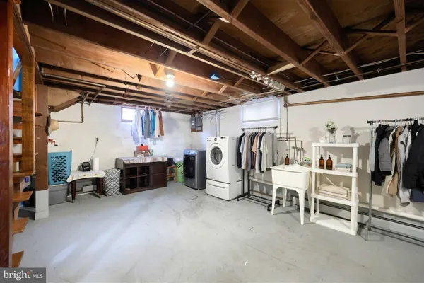 a room with furniture and a flat screen tv