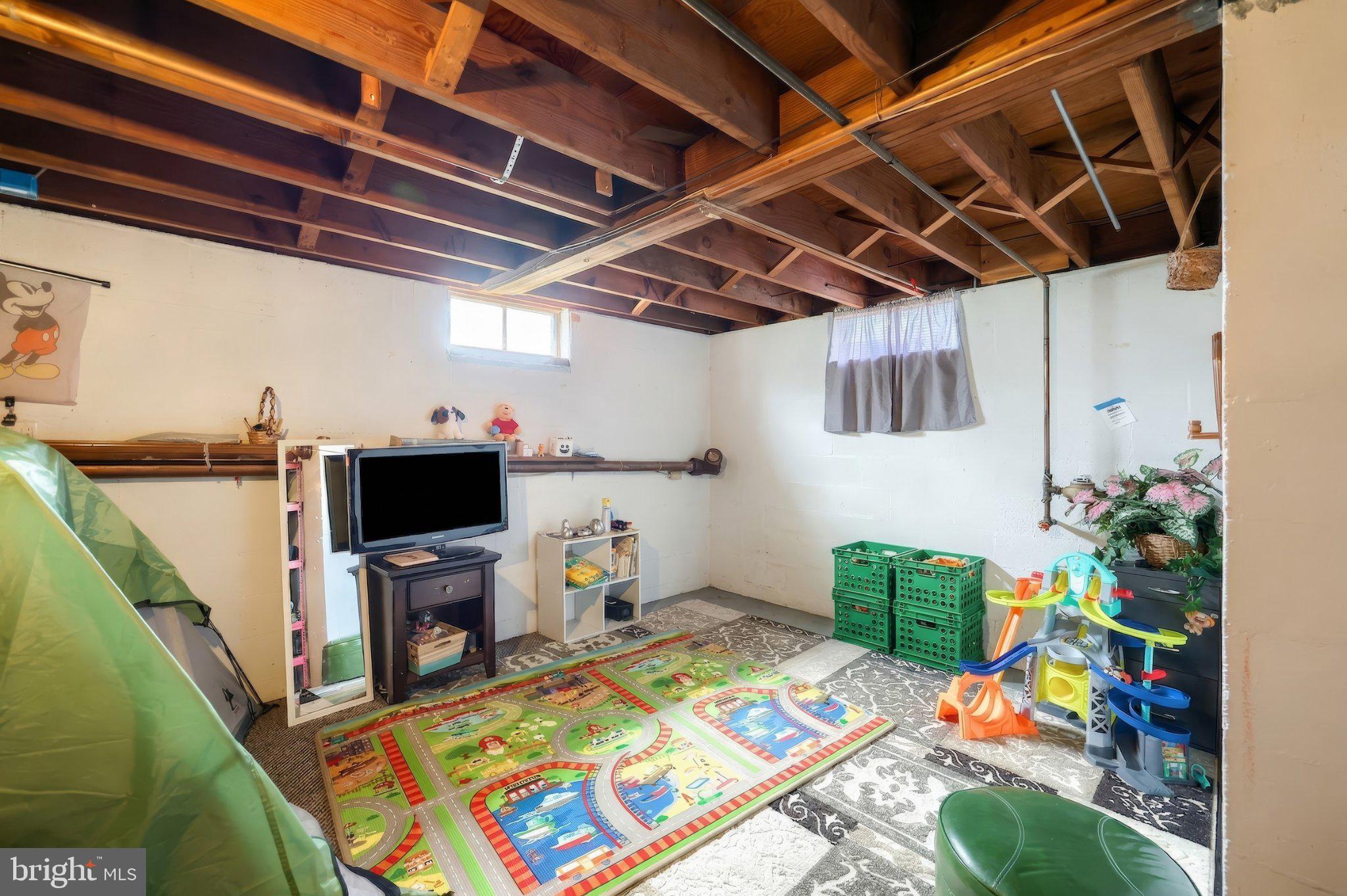 2208 Grandview Road Hanover, PA 17331 - Photo 39 of 39 a room with furniture and a flat screen tv