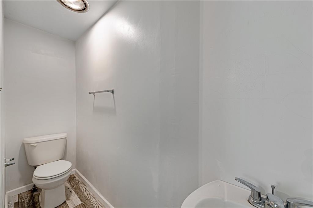 812 Buchanan Road White, PA 15490 - Photo 23 of 35 a white toilet sitting next to a shower