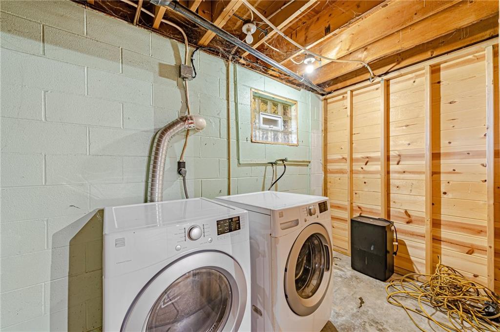 812 Buchanan Road White, PA 15490 - Photo 28 of 35 a utility room with dryer and washer