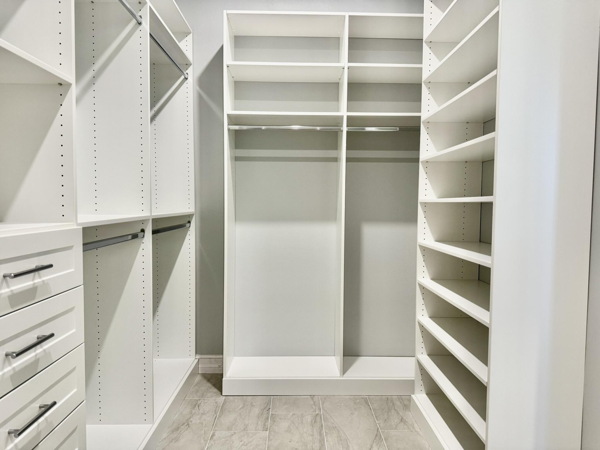 13200 Highway 441 Okeechobee, FL 34974 - Photo 12 of 42 a view of walk in closet with empty racks