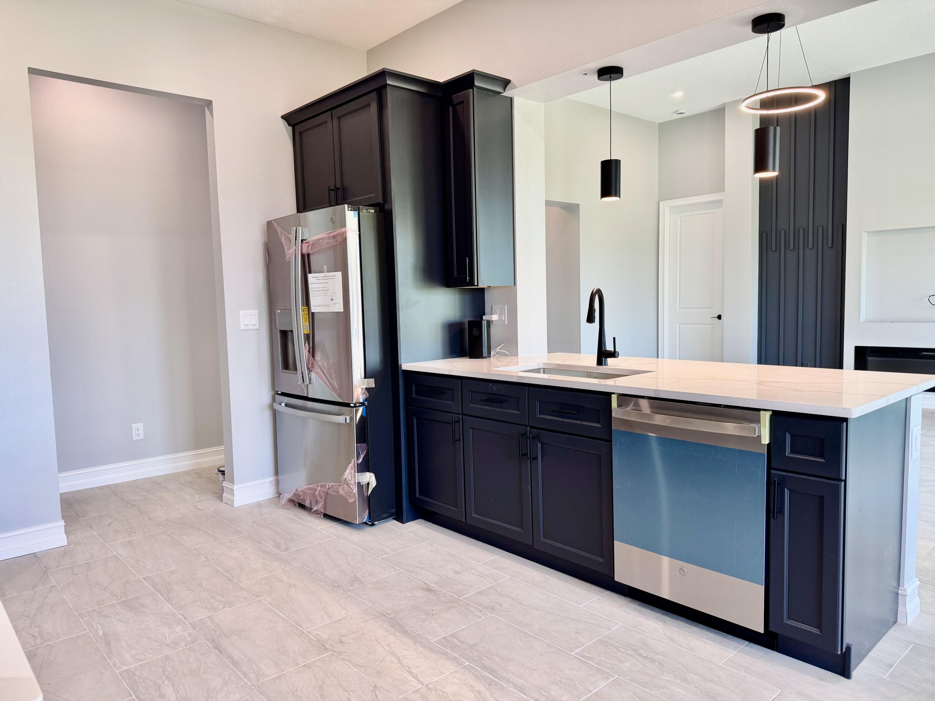 13200 Highway 441 Okeechobee, FL 34974 - Photo 19 of 42 a bathroom with a double vanity sink and a mirror