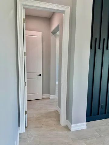 a bathroom with a sink vanity and mirror