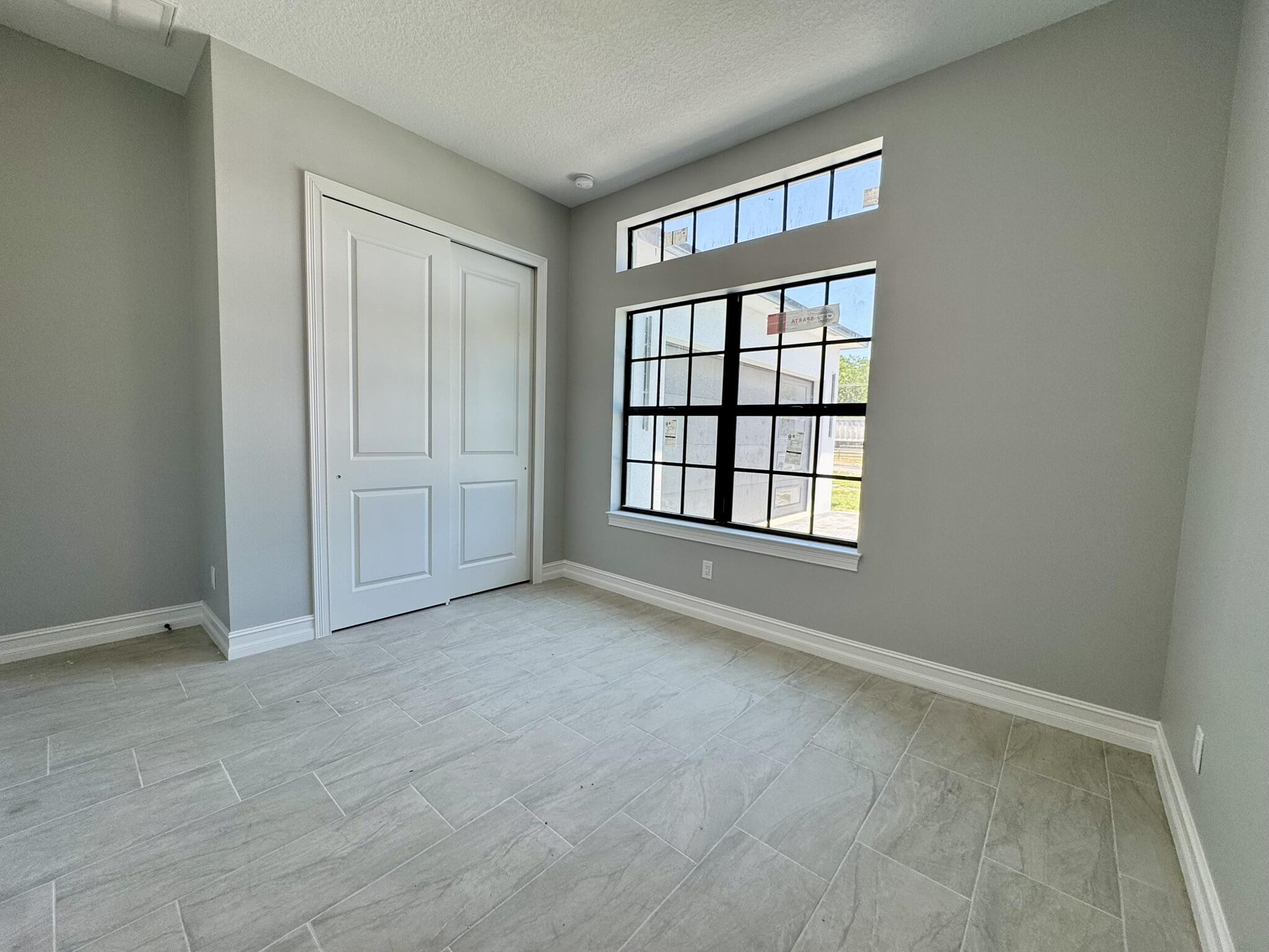 13200 Highway 441 Okeechobee, FL 34974 - Photo 23 of 42 a view of an empty room with a window