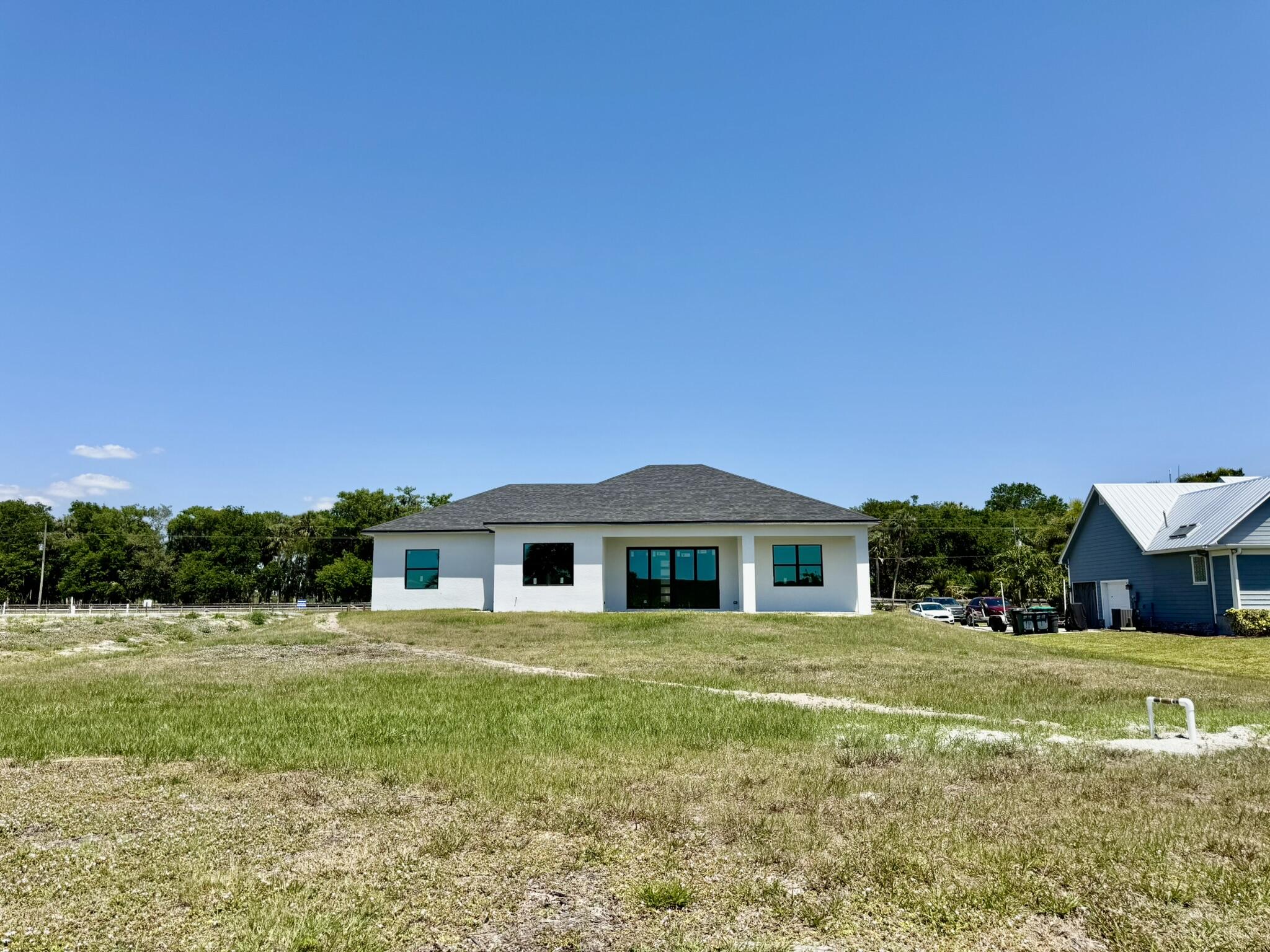 13200 Highway 441 Okeechobee, FL 34974 - Photo 39 of 42 a view of a house with a yard