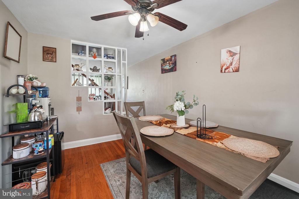 1918 Church Road Baltimore, MD 21222 - Photo 11 of 29 a view of a dining room with furniture and wooden floor