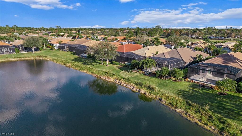 7875 Valencia Court Naples, FL 34113 - Photo 35 of 38 Aerial view of residential area featuring a large body of water