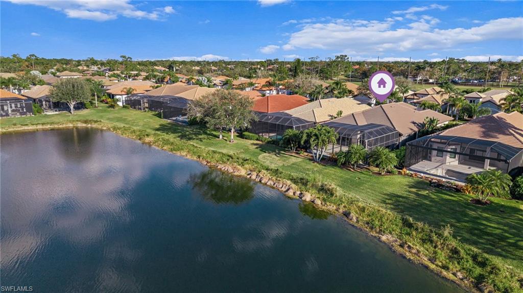7875 Valencia Court Naples, FL 34113 - Photo 36 of 38 Aerial view of residential area with a large body of water