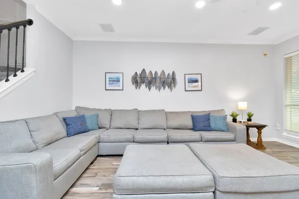 a living room with furniture and a couch