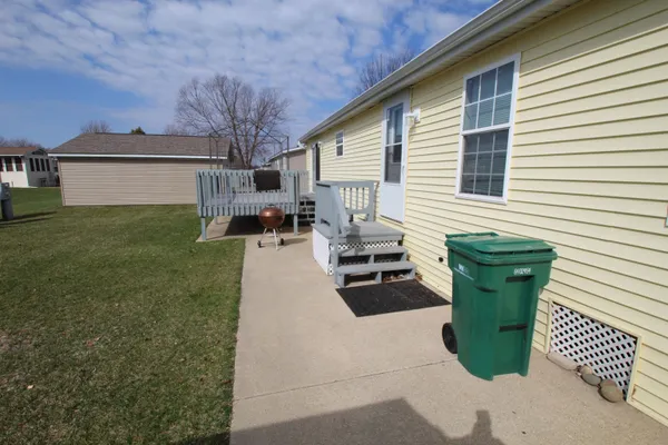 a view of a back yard of the house
