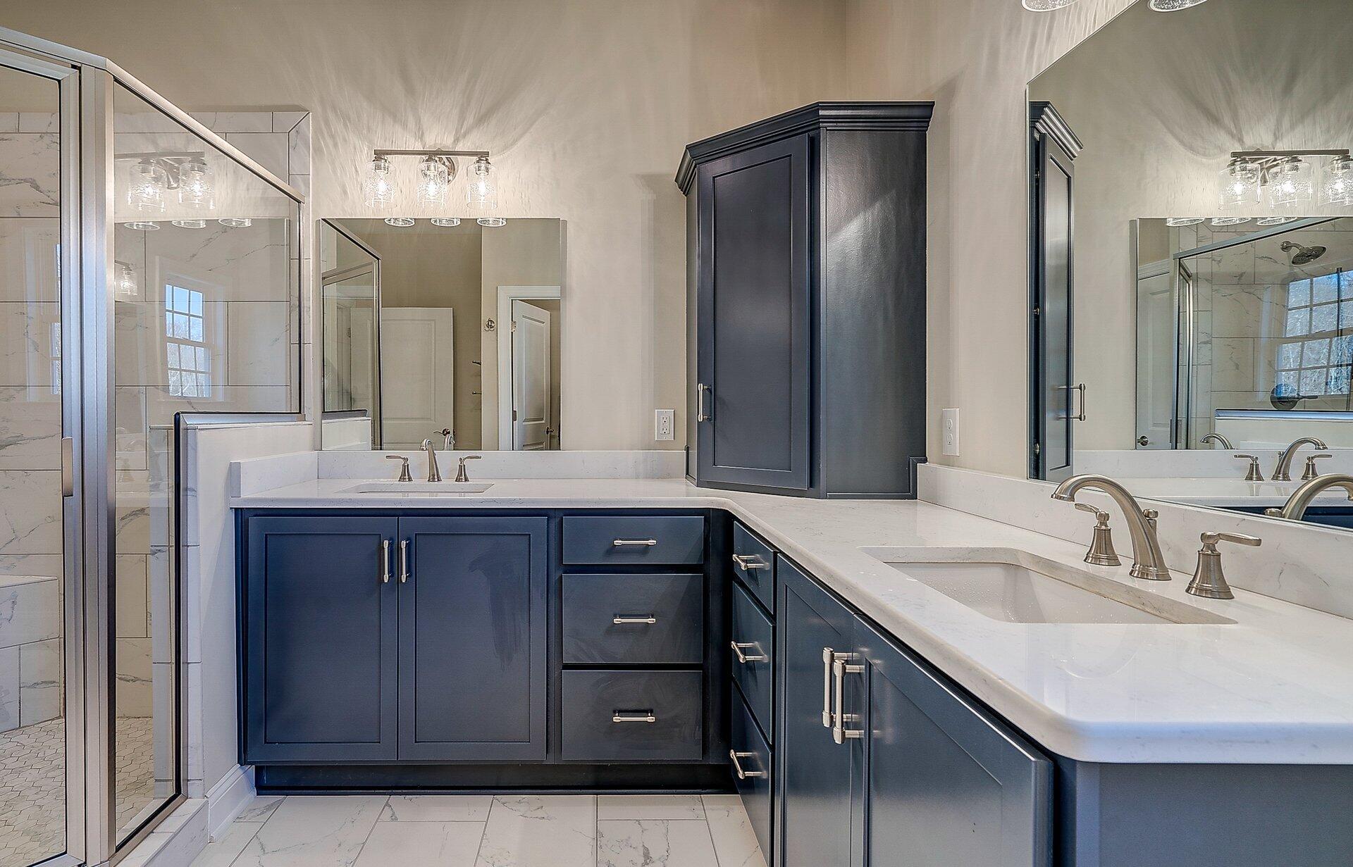 6917 Fairway Ridge Road Salem, VA 24153 - Photo 11 of 12 a bathroom with a double vanity sink and a mirror