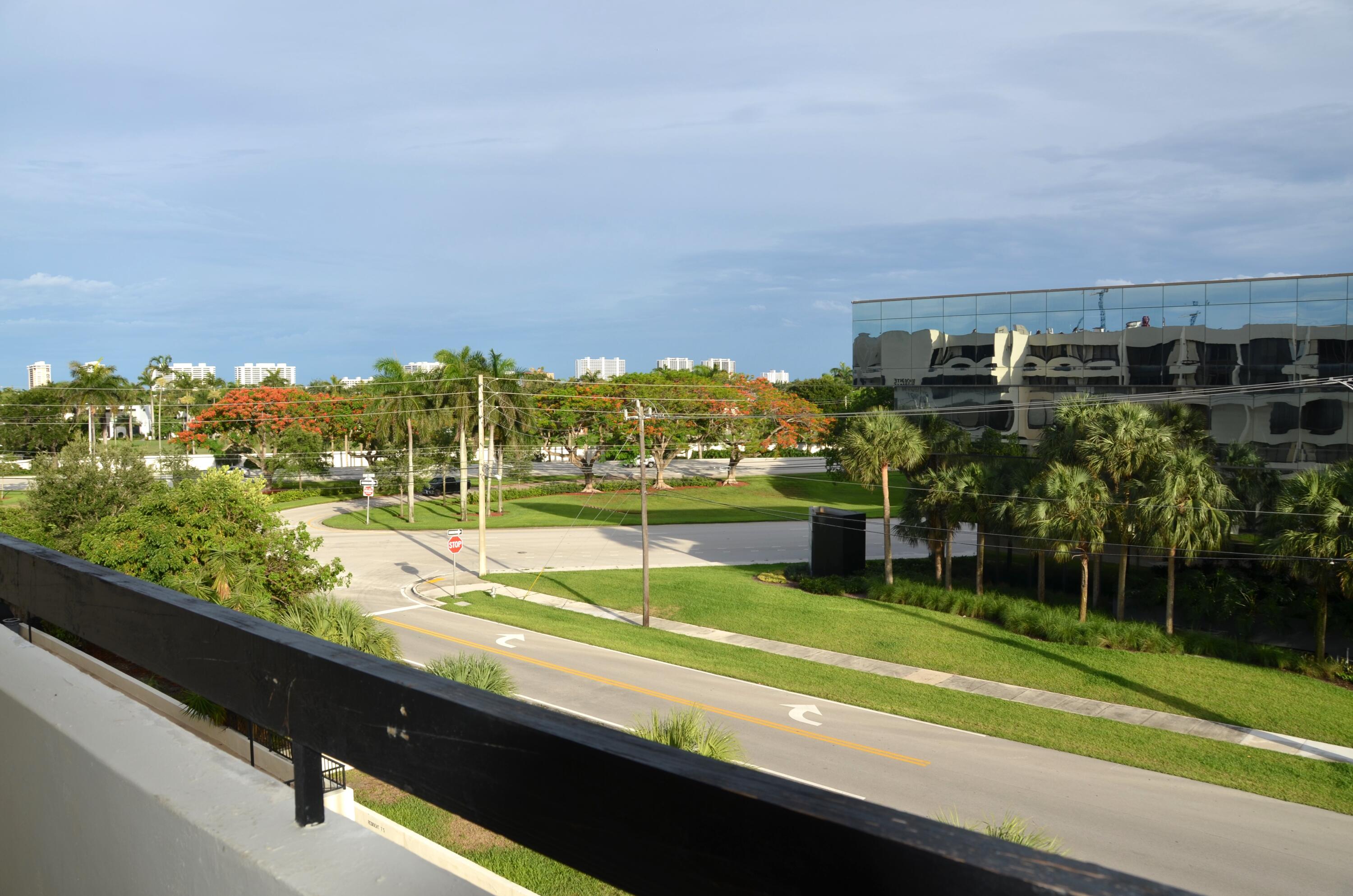 a view of swimming pool from a balcony