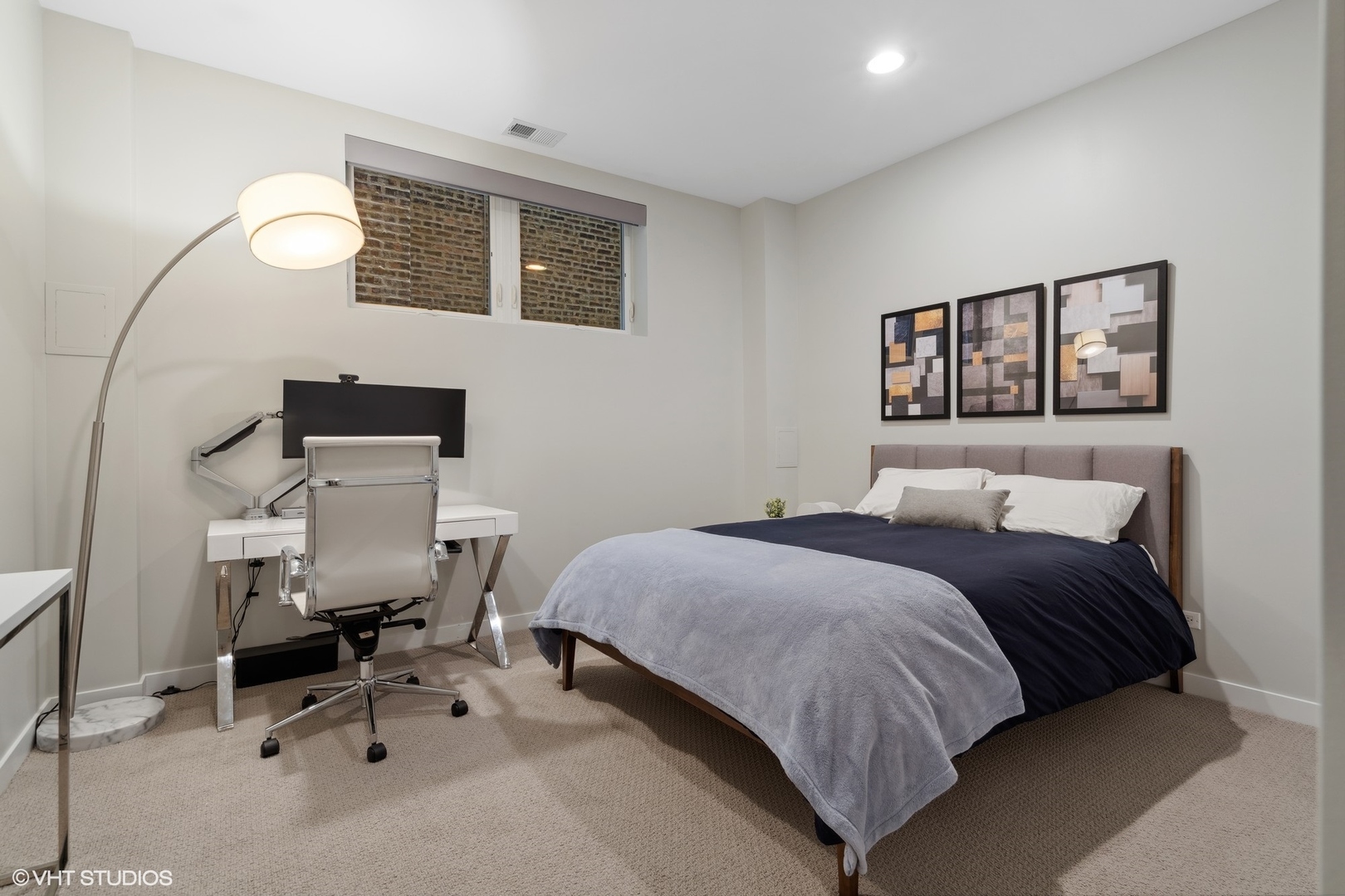 1033 South Racine Avenue, Unit 1S Chicago, IL 60607 - Photo 17 of 29 a bedroom with a bed and furniture