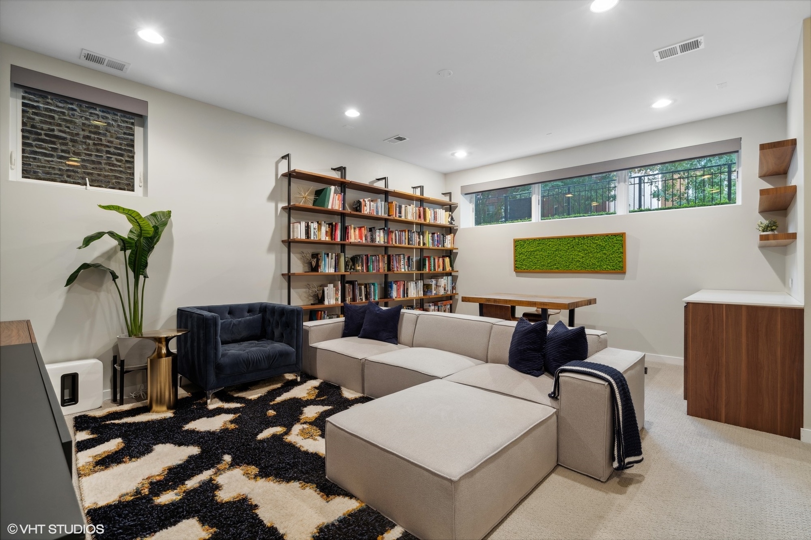 1033 South Racine Avenue, Unit 1S Chicago, IL 60607 - Photo 20 of 29 a living room with furniture and a flat screen tv