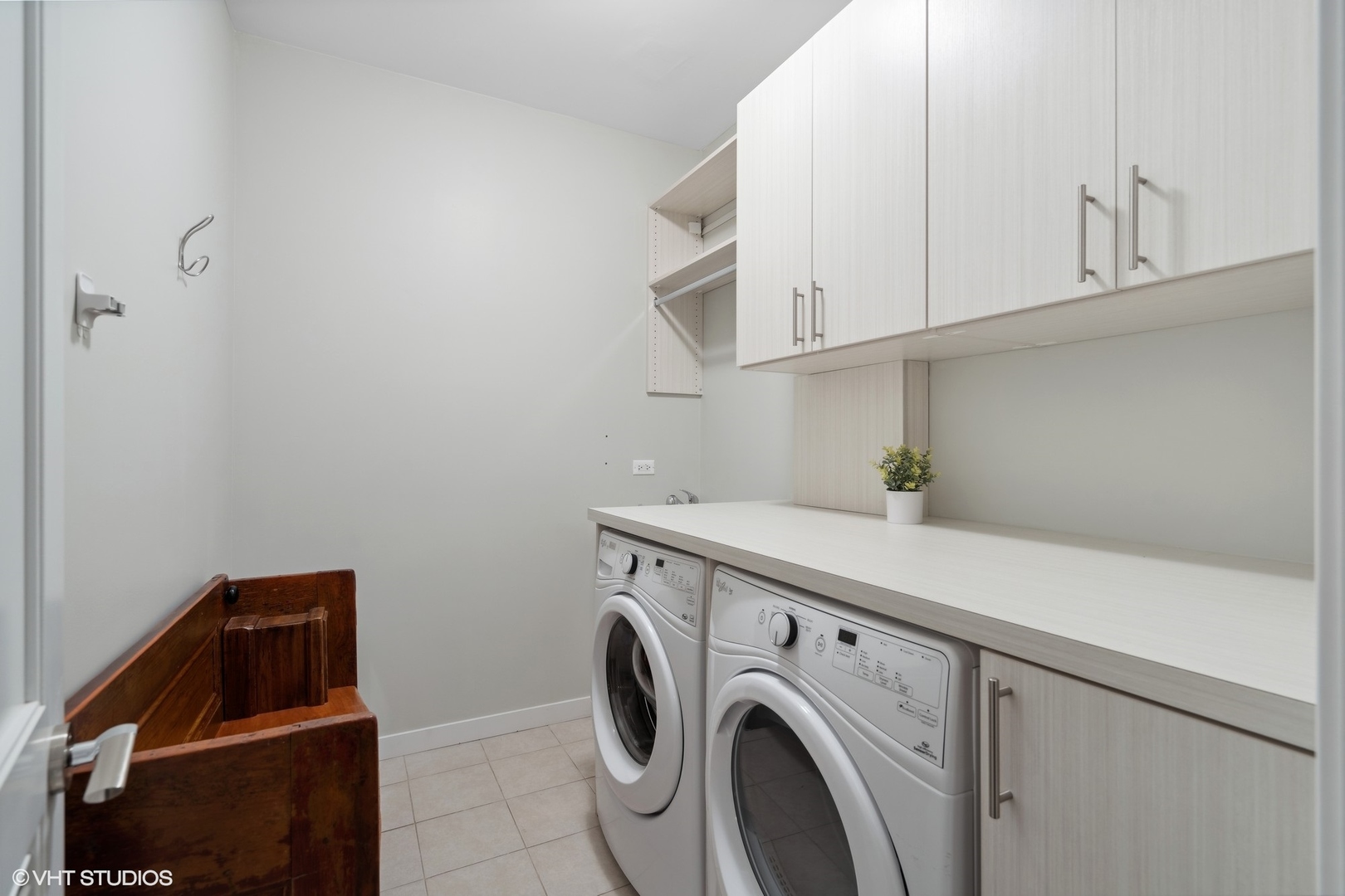 1033 South Racine Avenue, Unit 1S Chicago, IL 60607 - Photo 23 of 29 a utility room with dryer and washer