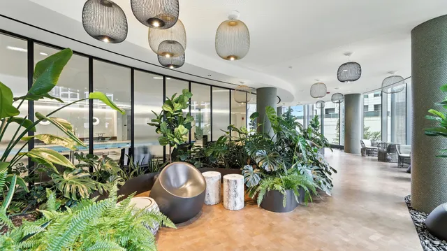 a view of a entryway with flower pots