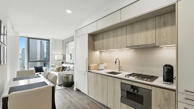 a kitchen with a stove and a refrigerator