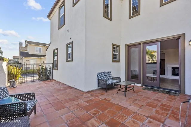 a view of entryway and hall with a front door