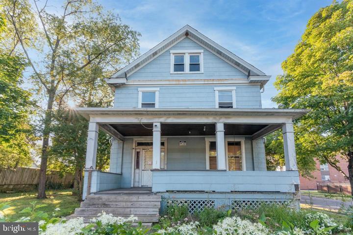 3900 5th Street Baltimore, MD 21225 - Photo 1 of 32 a view of a house with a yard