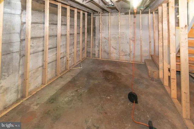 a bathroom with a toilet and a sink