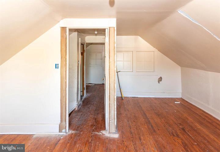 3900 5th Street Baltimore, MD 21225 - Photo 22 of 32 a view of a bathroom with wooden floor