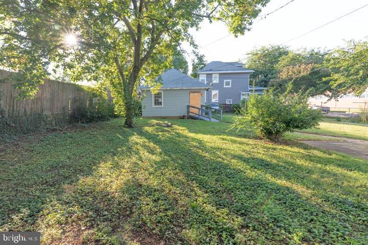 3900 5th Street Baltimore, MD 21225 - Photo 8 of 32 a view of a big yard next to a house