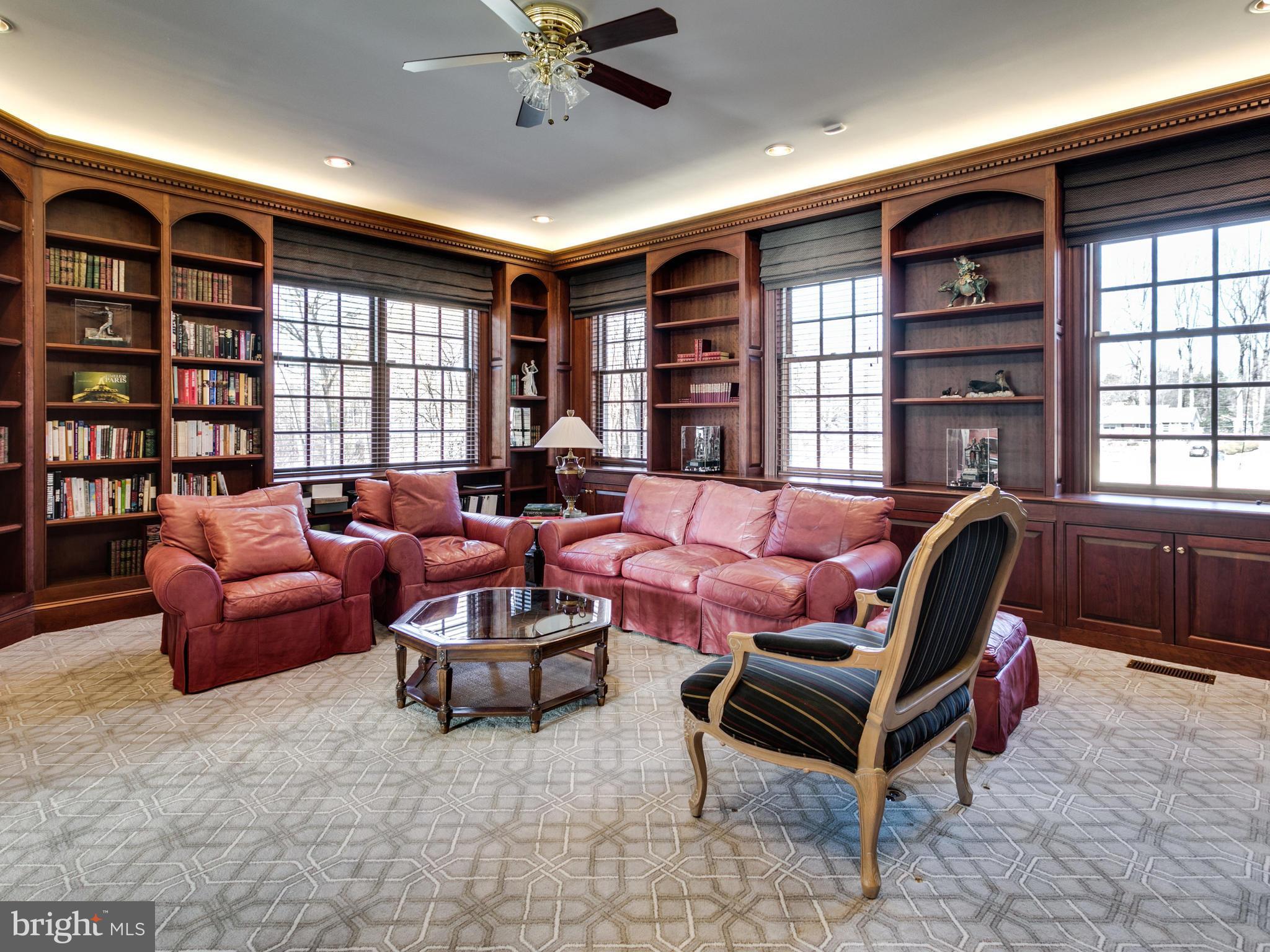10207 East Hunter Valley Road Vienna, VA 22181 - Photo 12 of 26 LIBRARY ADJACENT TO STUDY W MAHOGANY BOOKCASES