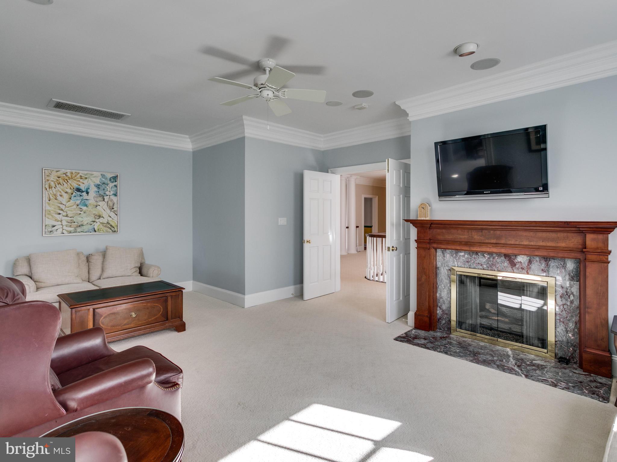 10207 East Hunter Valley Road Vienna, VA 22181 - Photo 14 of 26 MASTER SUITE SITTING RM W FP