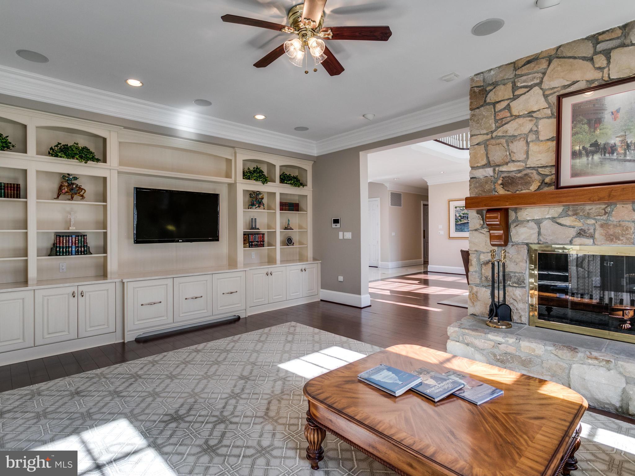 10207 East Hunter Valley Road Vienna, VA 22181 - Photo 10 of 26 FAMILY RM ON MAIN LVL W 2 SIDED FIREPLACE