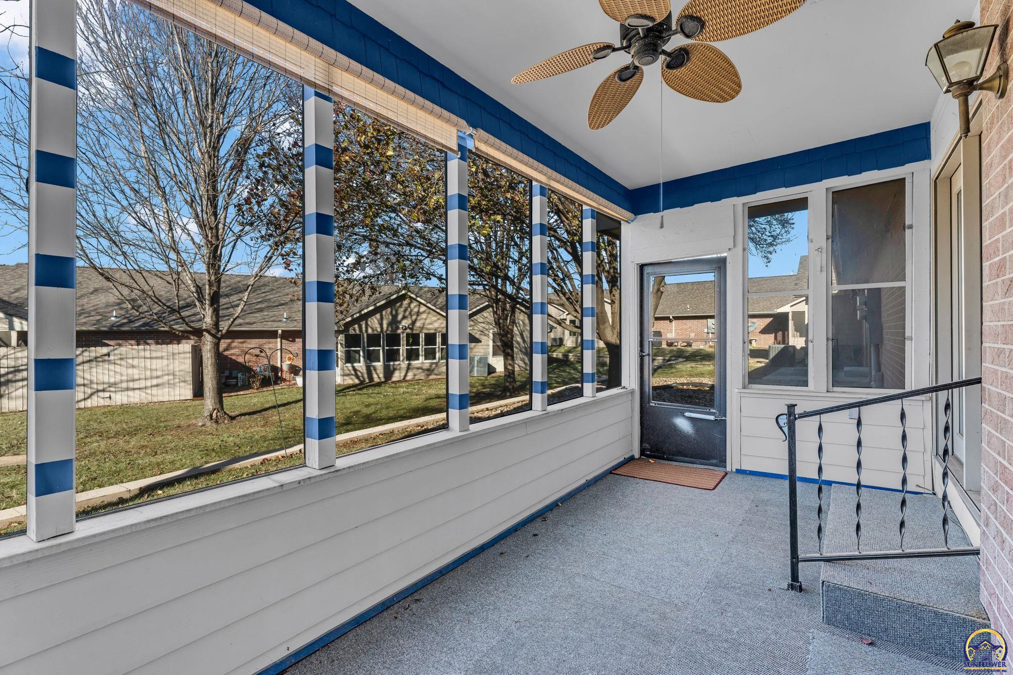 2393 Southwest Honeysuckle Lane Topeka, KS 66614 - Photo 18 of 40 Screened in Porch